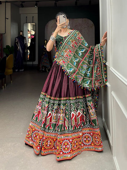 Vibrant Elegance: Brown and Green Dola Silk Lehenga with Gamthi and Mirror Work